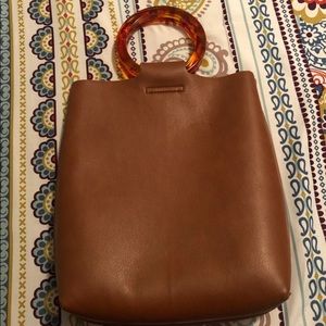 Open latch ring purse